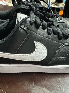 Women’s Nike Court Vision Black Leather Sneakers with White Swoosh